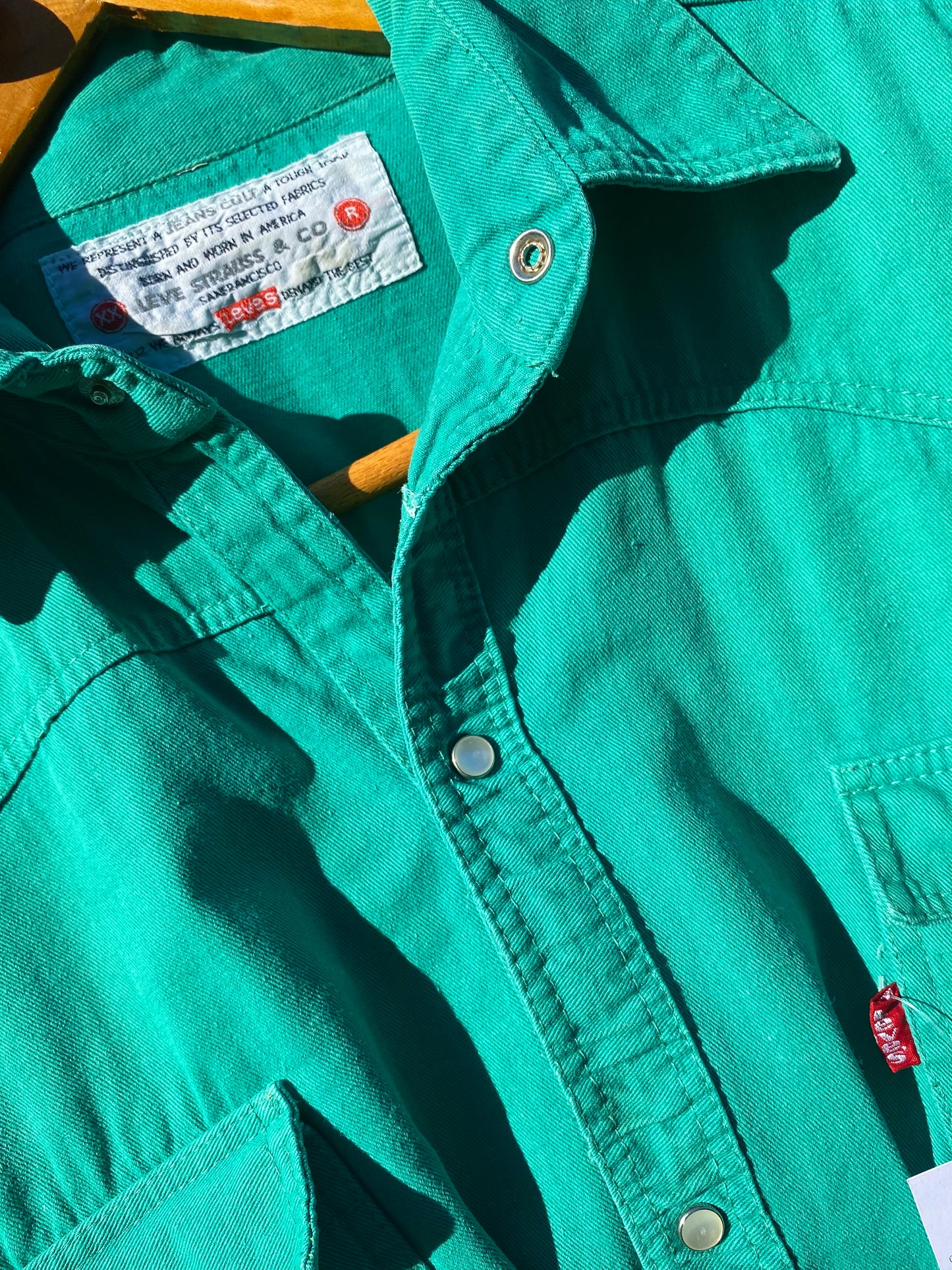 Green Levi’s shirt