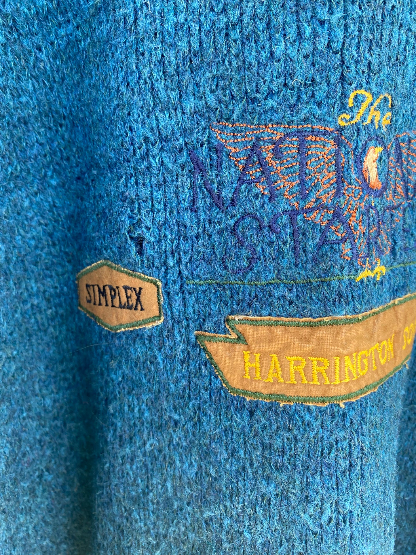 Blue vintage sweater with embroidered details