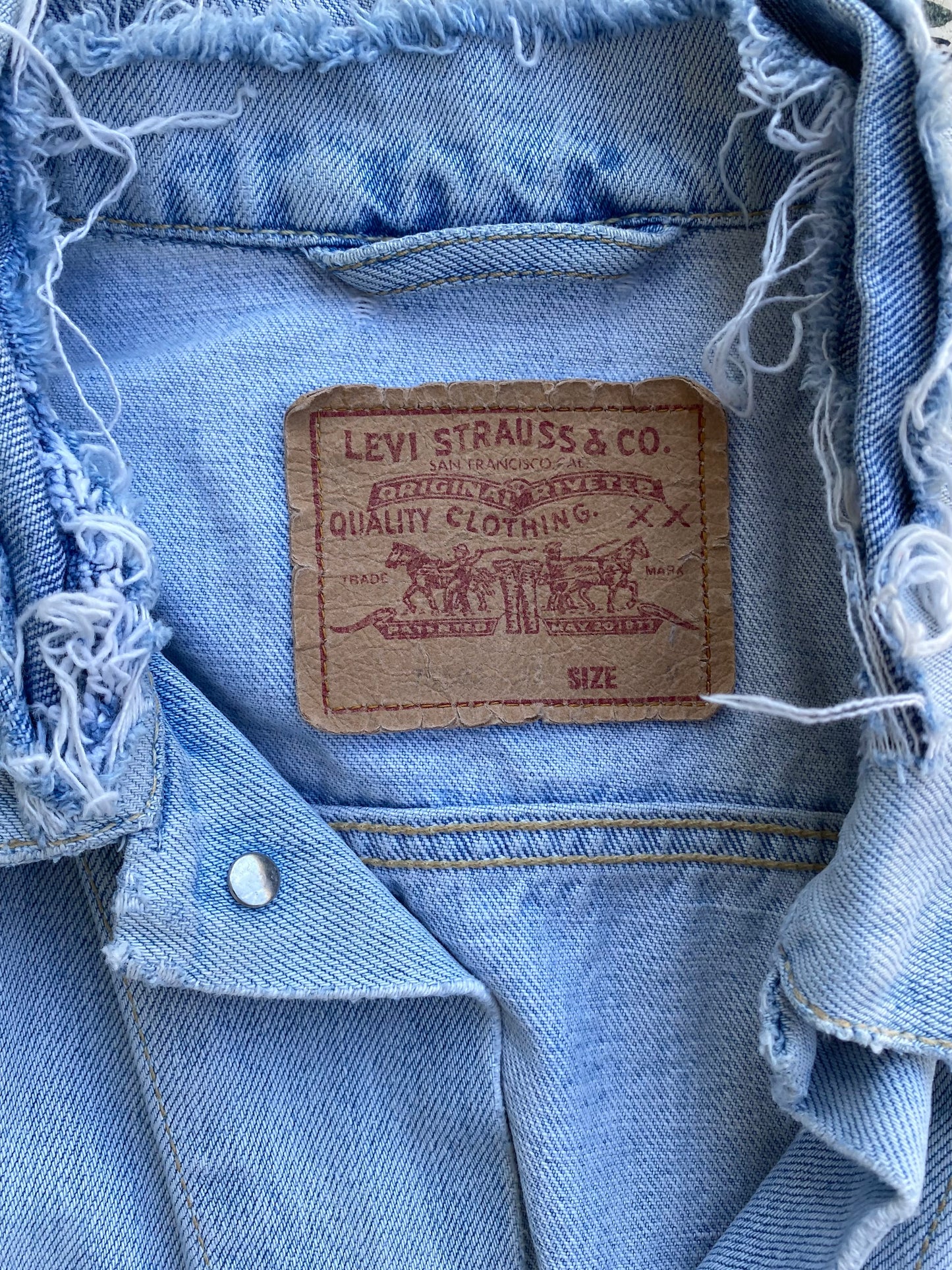 Levi’s light washed jean jacket - small reworked touch