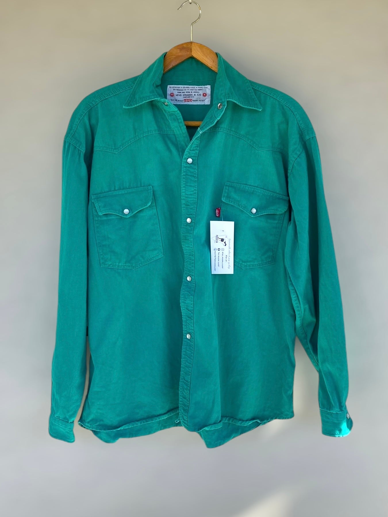 Green Levi’s shirt