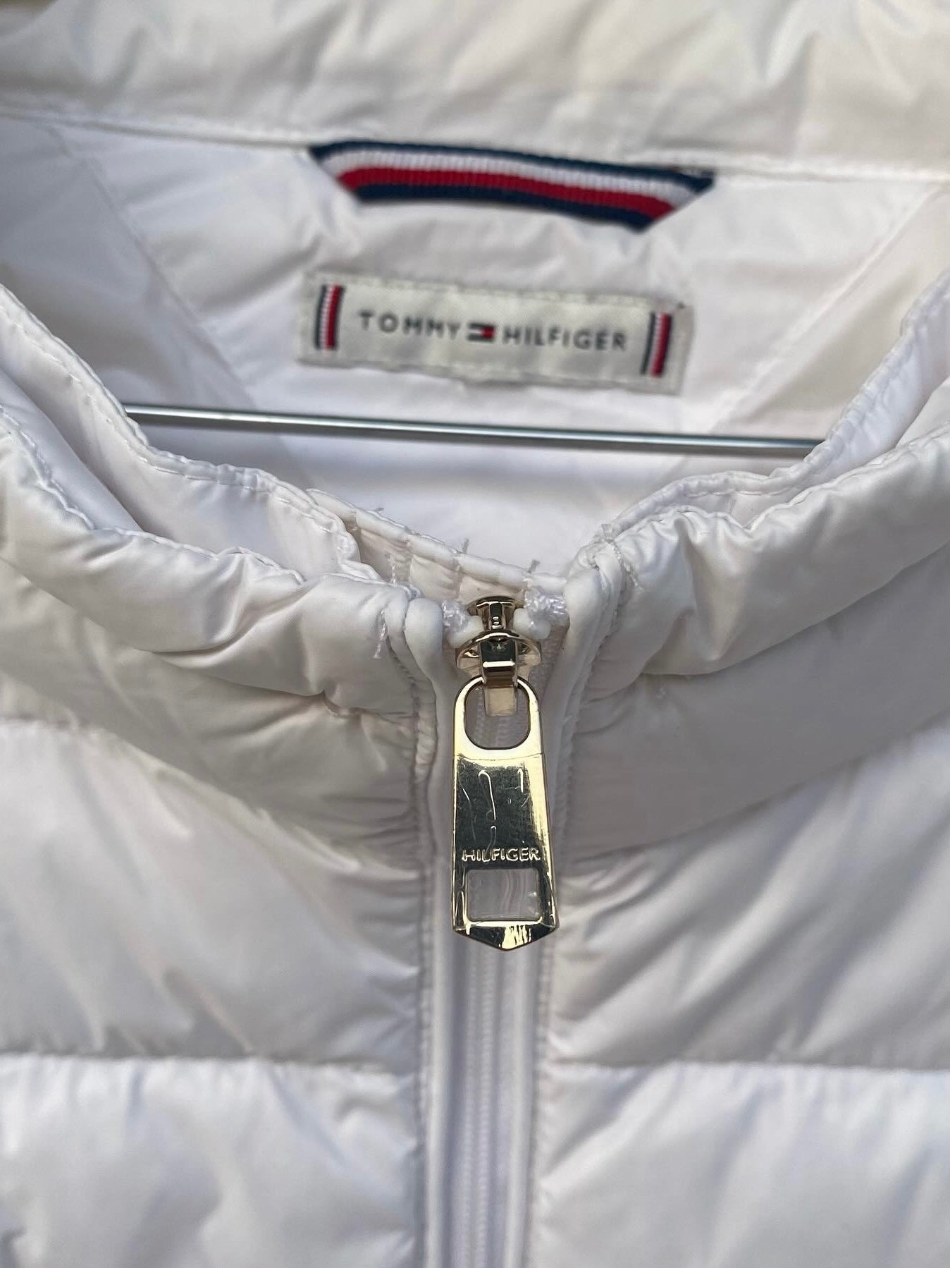 White Tommy Hilfiger sleeveless jacket