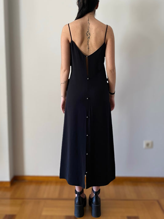 Vintage black dress with unique buttons on the back