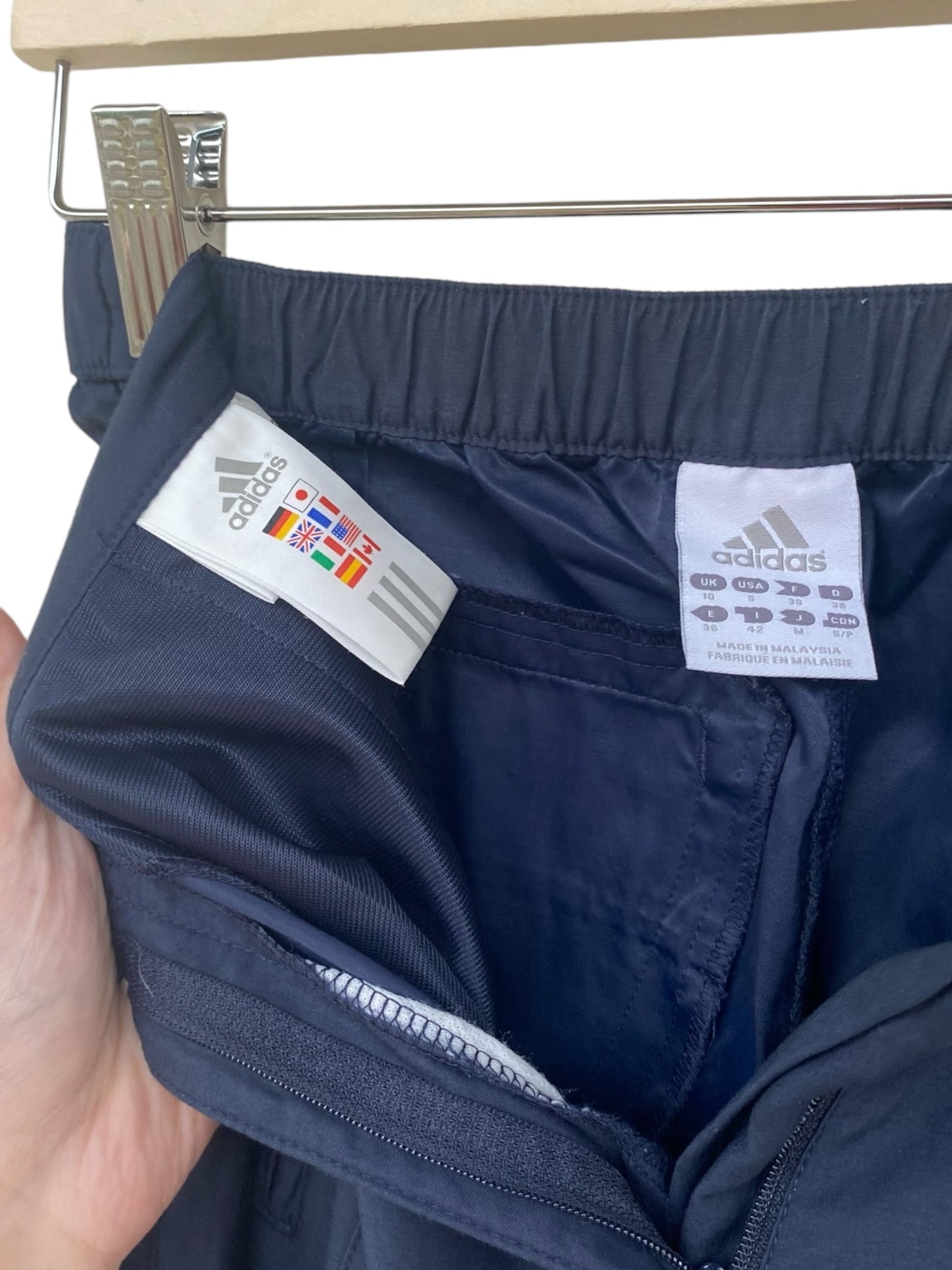 Rare Adidas flare track pants in dark blue