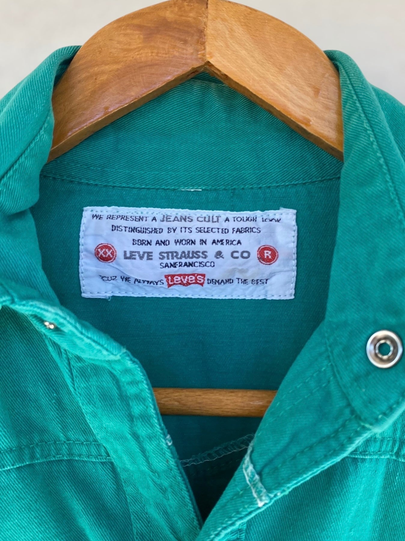 Green Levi’s shirt